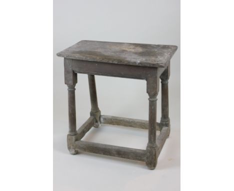 A 17th century oak joint stool, 49cm high (NC)