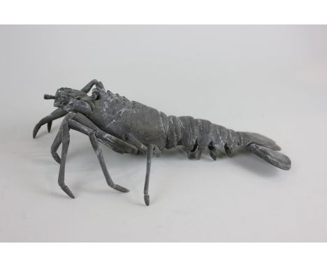 A 19th century Japanese bronze model of a lobster with jointed legs and body, 24cm long, (a/f) (NC)