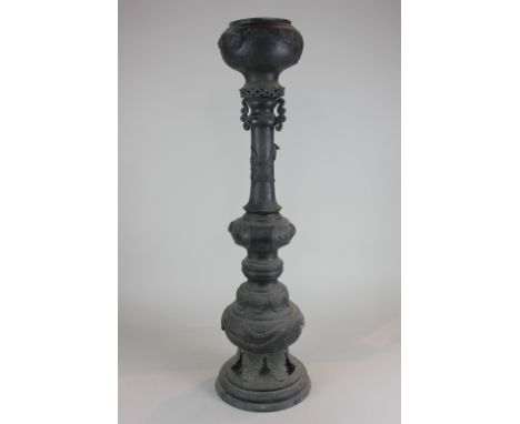 A Japanese bronze jardiniere and stand, baluster shape, decorated with storks and blossom, 79cm high, (NC)