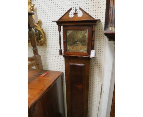 A walnut grandmother clock, traditional style with square brass dial and chiming movement, with key, 5ft. 3in. 
