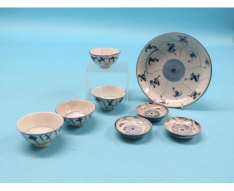 An 18th/19th century Chinese plate, painted with Lotus pattern in underglaze blue, four similar sake cups and three saucers