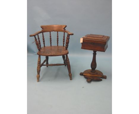 A Victorian smoker's bow armchair, beech with elm seat, some worm, together with a Victorian mahogany work box, on pedestal s