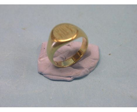 An 18ct. gold signet ring, size S, 12.2 grams
