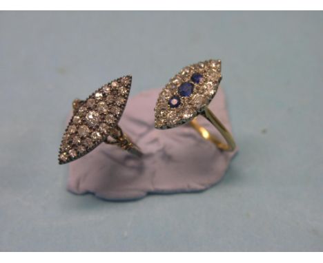 An 18ct. gold, diamond and sapphire marquise ring, size N, and one other diamond marquise ring, hallmark indistinct