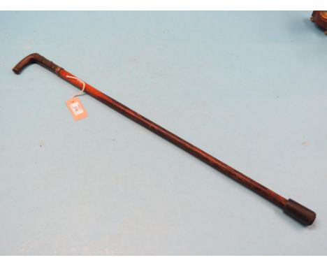 A dual-purpose walking stick - swordstick, 12in. steel blade and horn handle