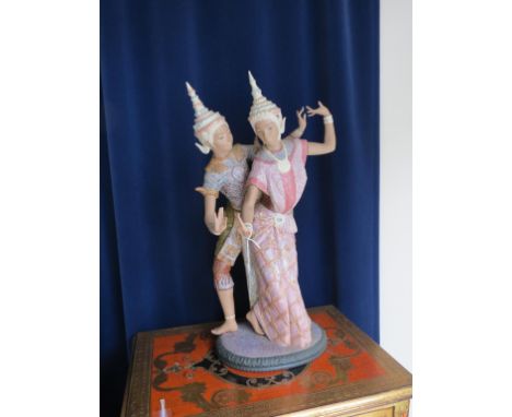 A large Lladro figure group, male and female eastern dancers, 21in. - female right thumb lacking