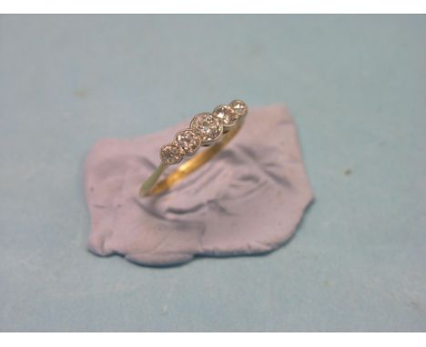 An 18ct. gold and diamond half-hoop ring, graduated stones, largest 0.4ct. size P