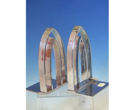 A CHARLIE CHAPLIN TOLE TRAY, A PAIR OF BAKELITE HANDLES, A PAIR OF CHROME PLATED GOTHIC ARCH BOOKENDS.   H 17cms. TOGETHER WI