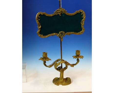 AN ORMOLU FRENCH ADJUSTABLE LAMP ON A SQUARE COLUMN ABOVE TWO FOLIATE CANDLE NOZZLES ABOVE THE ROCOCO FOOT.&nbsp; &nbsp;H 62 