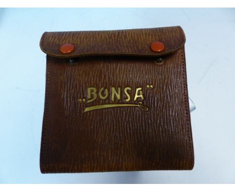 A LEATHER CASED SET OF ELEVEN BONSA TOOLS