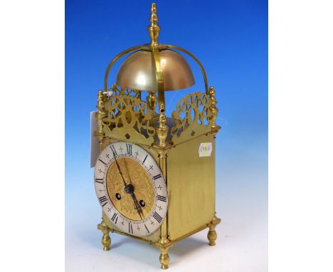 A LANTERN CLOCK WITH JAPY FRERES PLATFORM ESCAPEMENT MOVEMENT STRKING ON A BELL. H 30cms.