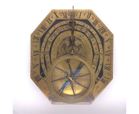 AN EARLY 18TH CENTURY FRENCH BRASS BUTTERFIELD TYPE COMPASS SUNDIAL SIGNED CADOT PARIS 1737 ELONGATED OCTAGONAL FORM WITH TRI