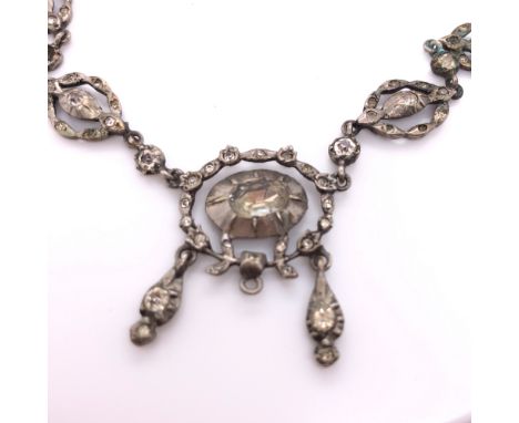 AN ANTIQUE CONTINENTAL SILVER AND PASTE STONE LAVALIER STYLE NECKLET, LENGTH 40cms, TOGETHER WITH A PAIR OF VICTORIAN HALLMAR