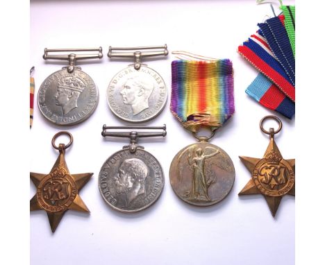 TWO FIRST WORLD WAR MEDALS AWARDED TO PRIVATE F BRAZIER OF THE RHODESIA REGT TOGETHER WITH FOUR UNINSCRIBED SECOND WORLD WAR 