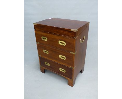 A BRASS BOUND MAHOGANY TWO HANDLED CAMPAIGN STYLE CHEST, THE COFFER TOP OVER TWO CONCEIT AND A REAL DRAWER ABOVE BRACKET FEET