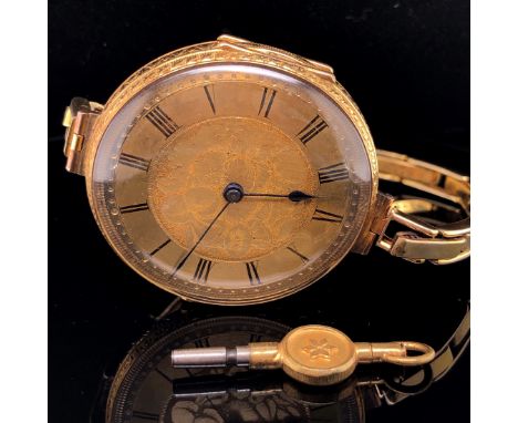 AN 18ct GOLD SWISS FOB WATCH REMODELLED AS A WRIST WATCH, CASE MARKED WITH SWISS HELVETIA PORTRAIT, AND 18K STAMPED, DUST CAS