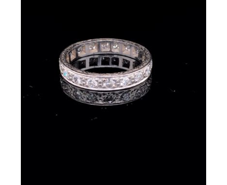 AN ANTIQUE WHITE GOLD AND GRAIN SET DIAMOND FULL ETERNITY RING RING. FINGER SIZE R 1/2. WEIGHT 4.6grms. 