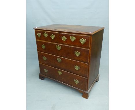 A GEORGE III OAK CHEST OF TWO SHORT AND THREE GRADED LONG DRAWERS ON BRACKET FEET. W 101 x D 56 x H 100.5cms.