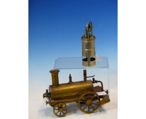 AN ANTIQUE  NICKEL VERTICAL STATIONARY HOT AIR ENGINE, THE CYLINDRICAL SHAPE TOPPED BY A FLYWHEEL.   Dia. 3.5 x H 10cms TOGET