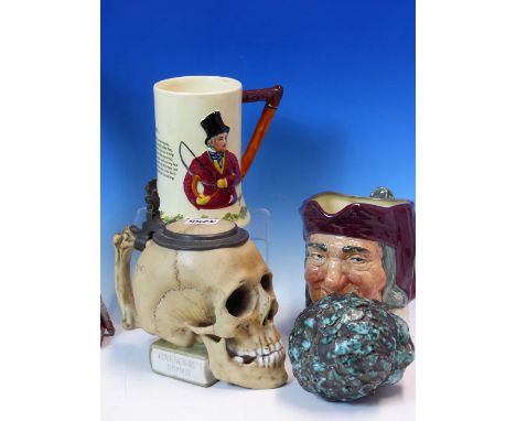 A GERMAN PORCELAIN SKULL TANKARD, A DOULTON SIMON CELLARER MASK JUG, A CHILDS CERAMIC HEAD, A CROWN DEVON JOHN PEEL MUSICAL P