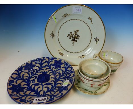 A BRISTOL GREEN FLORAL SWAGGED TEA BOWL, SAUCER AND TEA CUP, A PAIR OF NEW HALL TYPE TEA BOWLS, A PLATE AND A BLUE AND WHITE 
