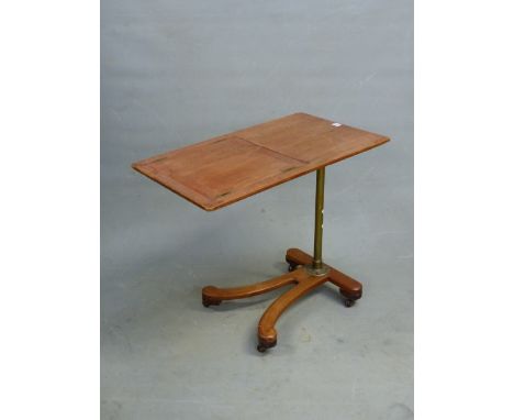 A&nbsp; LATE VICTORIAN MAHOGANY READING TABLE TO SLIDE OVER A BED, THE RECTANGULAR TOP WITH TWO EASEL BACKED LECTURNS, THE AD