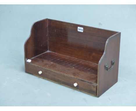 A 19th C. ROSEWOOD TWO HANDLED BOOK TROUGH, A DRAWER BELOW FITTED FOR WRITING WITH INKWELL AND CYLINDRICAL RULER, THE TROUGH.