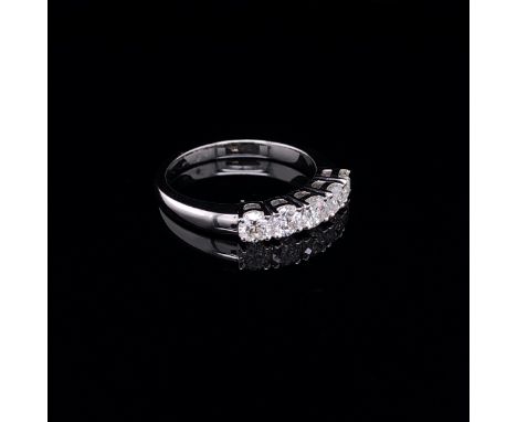 AN 18ct WHITE GOLD FIVE STONE DIAMOND HALF HOOP RING, APPROX. ESTIMATED DIAMOND WEIGHT 1.20cts. FINGER SIZE M. WEIGHT 3.7grms