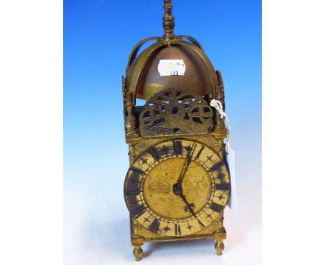 A LANTERN CLOCK, THE FRENCH TIMEPIECE MOVEMENT WITH PLATFORM ESCAPEMENT. H 28cms.