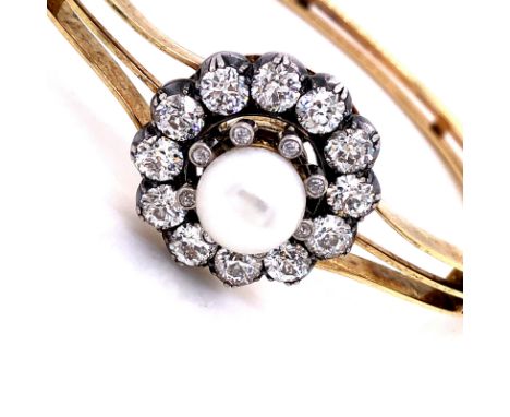 A LATE VICTORIAN NATURAL PEARL AND DIAMOND DETACHABLE CLUSTER BANGLE. THE CENTRAL CLUSTER CONSISTING OF A SINGLE NATURAL PEAR
