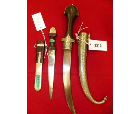 A JAMBIYA WITH WOODEN HANDLE AND NICKEL SCABBARD.   46cms. TOGETHER WITH A LEATHER HANDLED DAGGER WITH ROUND ARCH BLADE POMME
