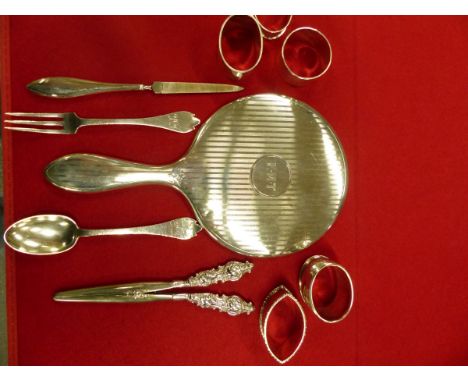 A SILVER BIRKS DRESSING TABLE MIRROR AND SILVER HANDLED NAIL FILE, A PAIR OF SILVER HANDLED GLOVE STRETCHERS WITH GERMAN SILV