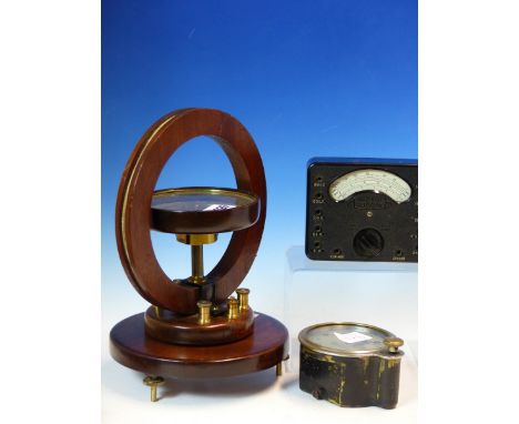 A MAHOGANY MOUNTED MAGNOMETER COMPASS, A UNIVERSAL AVOMINOR RESISTANCE METER IN LEATHER CASE AND A SMITH'S CAR CLOCK