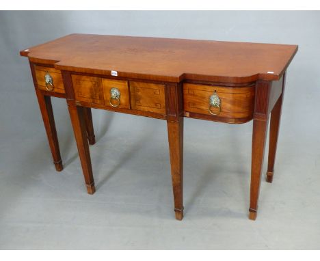 A 19th C. MAHOGANY SIDEBOARD, THE THREE DRAWERS TO THE BREAKFRONT LINE INLAID ABOUT LION MASK AND RING HANDLES AND FLANKED BY
