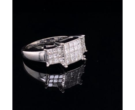 A 14ct WHITE GOLD MODERN MULTI PRINCESS CUT DIAMOND SET RING. THE THREE SECTIONS OF DIAMONDS MADE UP OF 34 INDIVIDUAL PRINCES