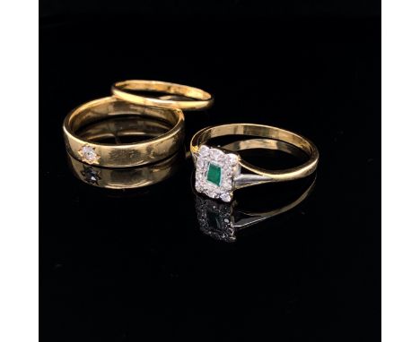 AN 18ct GOLD EMERALD AND DIAMOND RING, TOGETHER WITH AN 18ct GOLD DIAMOND SET BAND BOTH FINGER SIZE Q, GROSS WEIGHT 6.7grms, 