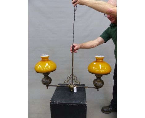 A VICTORIAN STYLE TWIN LIGHT CEILING LIGHT IN THE FORM OF DOUBLE OIL LAMPS. 85cm (W) x 55cm (H).