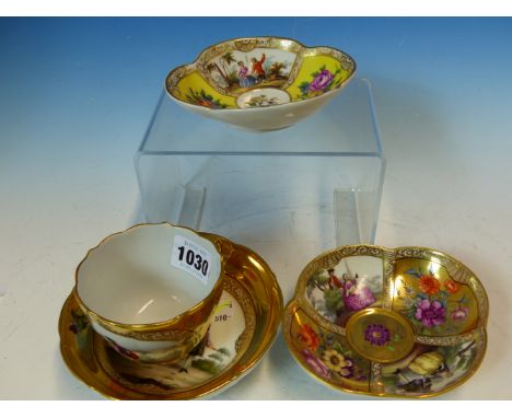 A MEISSEN GOLD GROUND CUP AND SAUCER PAINTED WITH 18th C. COUPLES TOGETHER WITH TWO MEISSEN QUATREFOIL SAUCERS PAINTED WITH P
