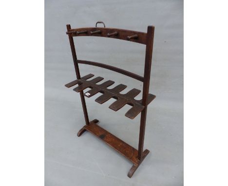 A 19th.C. MAHOGANY WHIP RACK WITH BRASS HANDLE AND SLED FEET. 62cm (W) x 96cm (H).