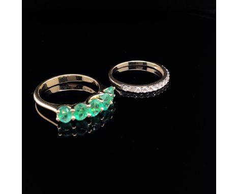 AN 18ct GOLD FIVE STONE MODERN EMERALD DRESS RING AND A 9ct GOLD CUBIC ZIRCONIA HALF ETERNITY RING, FINGER SIZE L. GROSS WEIG