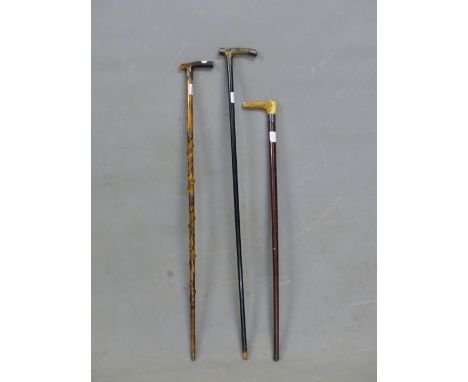 TWO HORN AND AN ANTLER HANDLED WALKING STICK WITH HALLMARKED SILVER BANDS