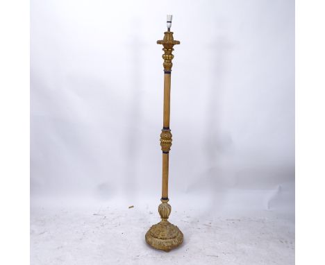 A turned wood and gilt standard lamp, height to top of bayonet fitting 171cm 