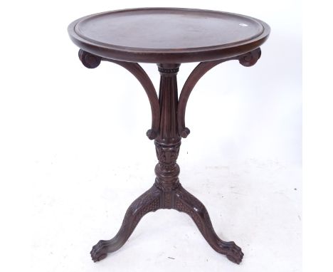 A hardwood circular lamp table, on carved tripod base, W45cm, H76cm 