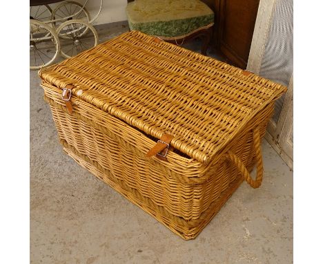 A wicker hamper with rope handles, W80cm, H45cm, D55cm 