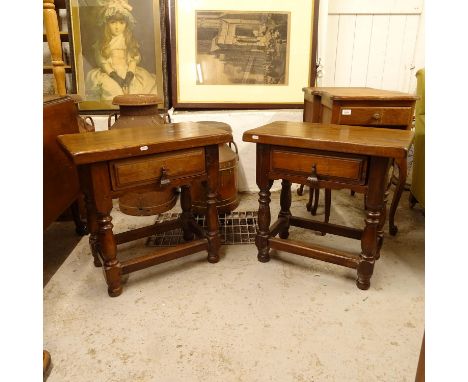 A pair of Spanish style oak lamp/side tables, with single drawers, on baluster legs, W60cm, H58cm, D37cm 