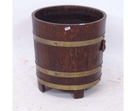 A coopered oak jardiniere/planter, W36cm, H38cm 