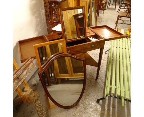 A 19th century satinwood-strung mahogany lady's vanity stand, the rising top revealing a sliding fitted mirror and interior, 