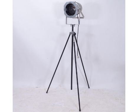 An aluminium-cased stage light on tripod stand 