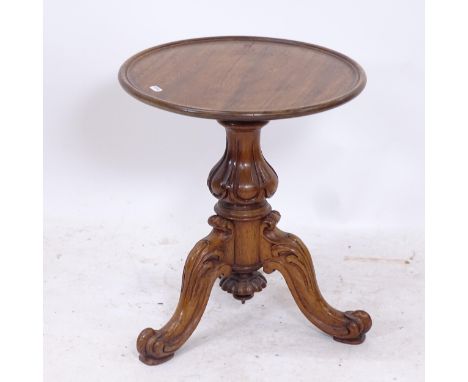 A Victorian acanthus leaf carved revolving wine table, on tripod base, W40cm 