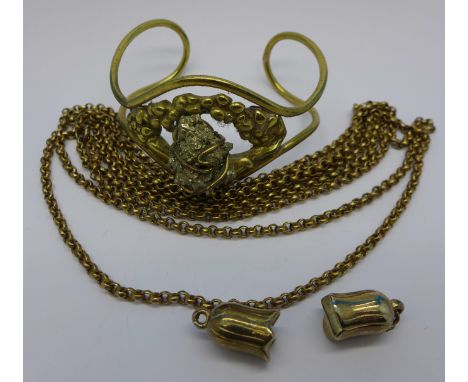 A bangle, a guard chain and two charms